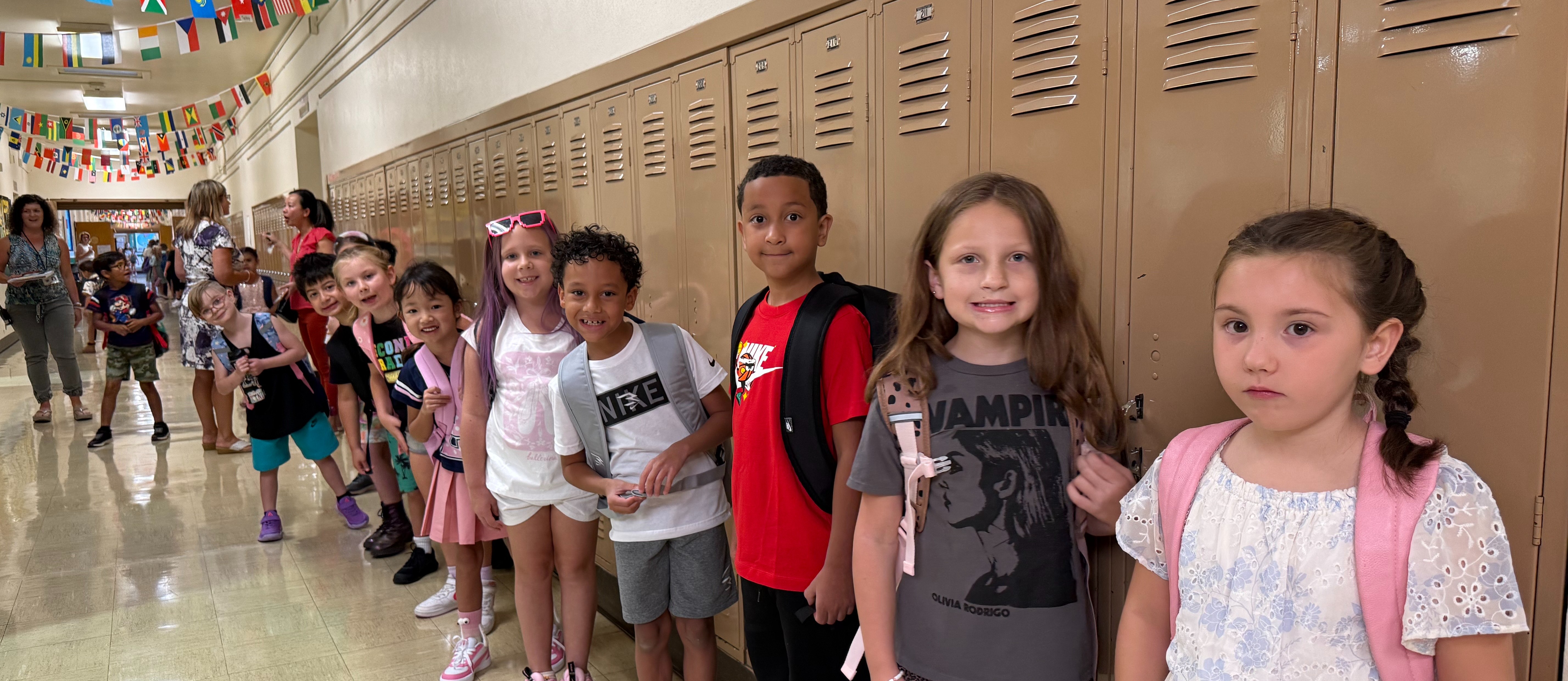 Students lined up  by lockers