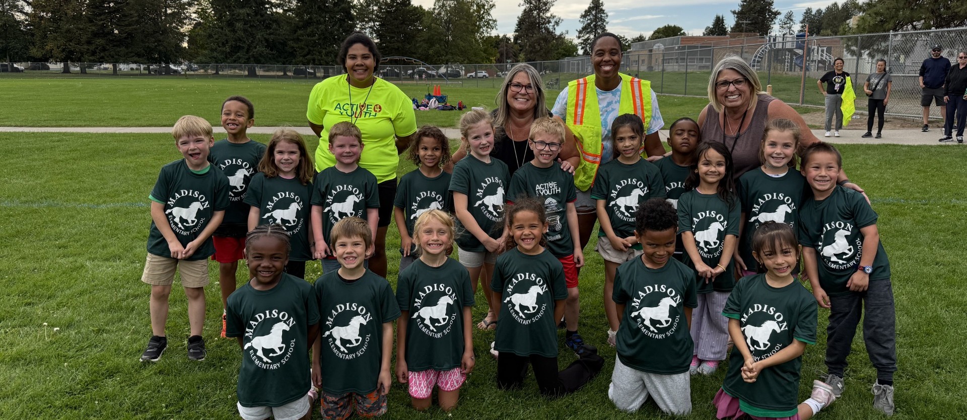 Madison Kindergarten and 1st Grade Cross Country with coaches.