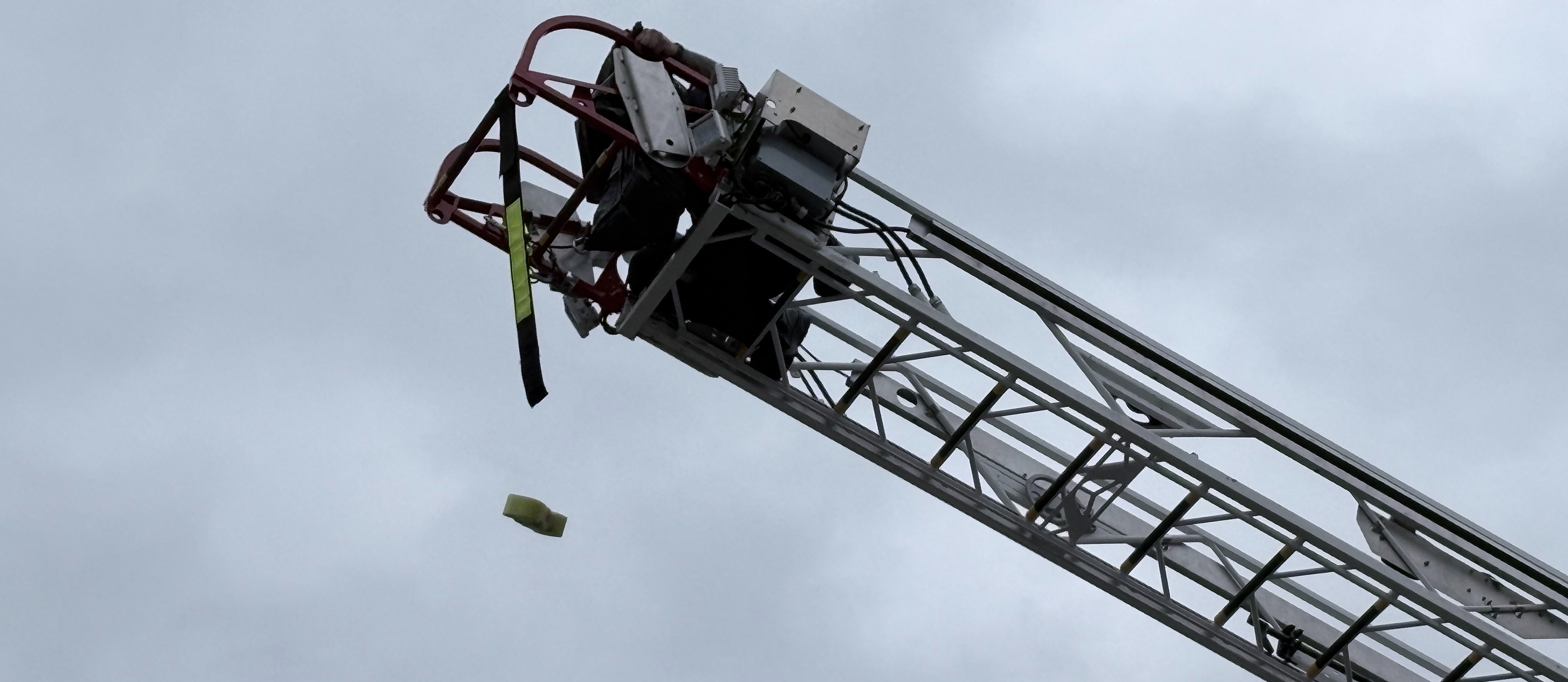 Fire truck ladder and falling egg chamber