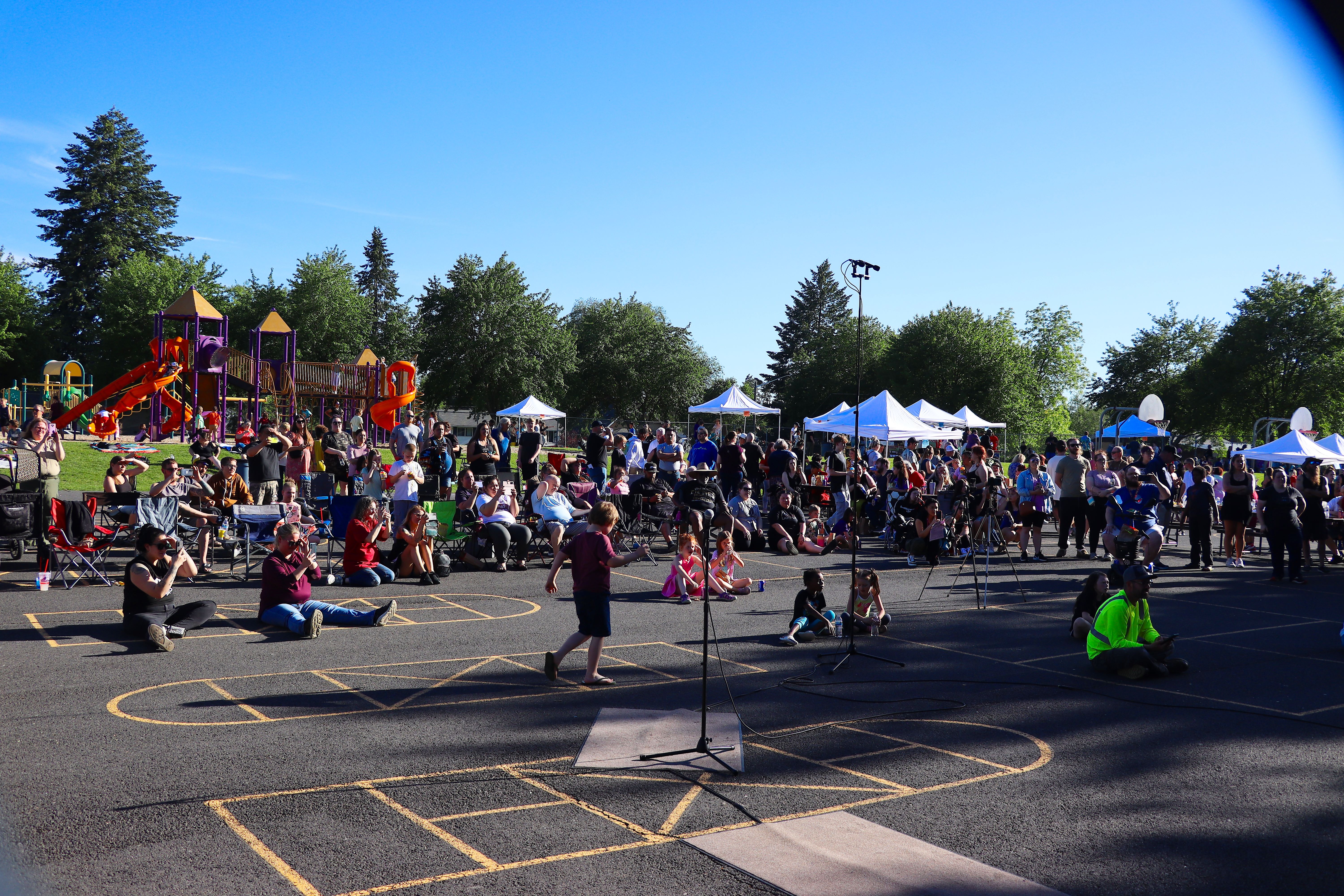 People participating in Spring STEM BBQ activities