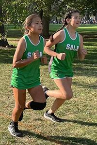 Two girls at cross country practice