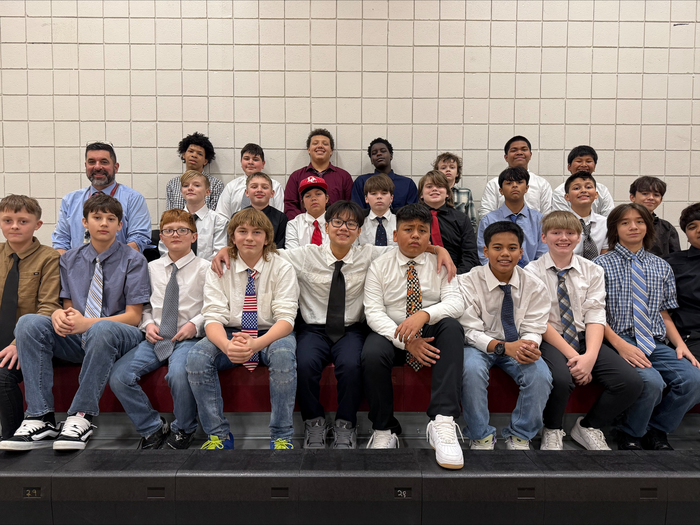 Boys basketball team dressed up for their first game