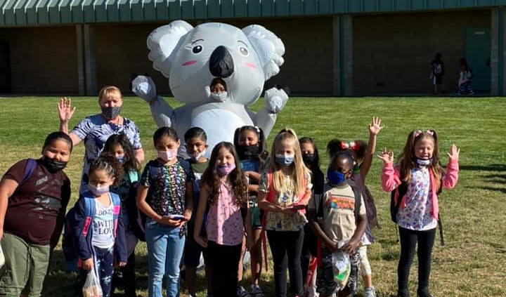Our kindergartners say hello, with our giant inflatable koala!