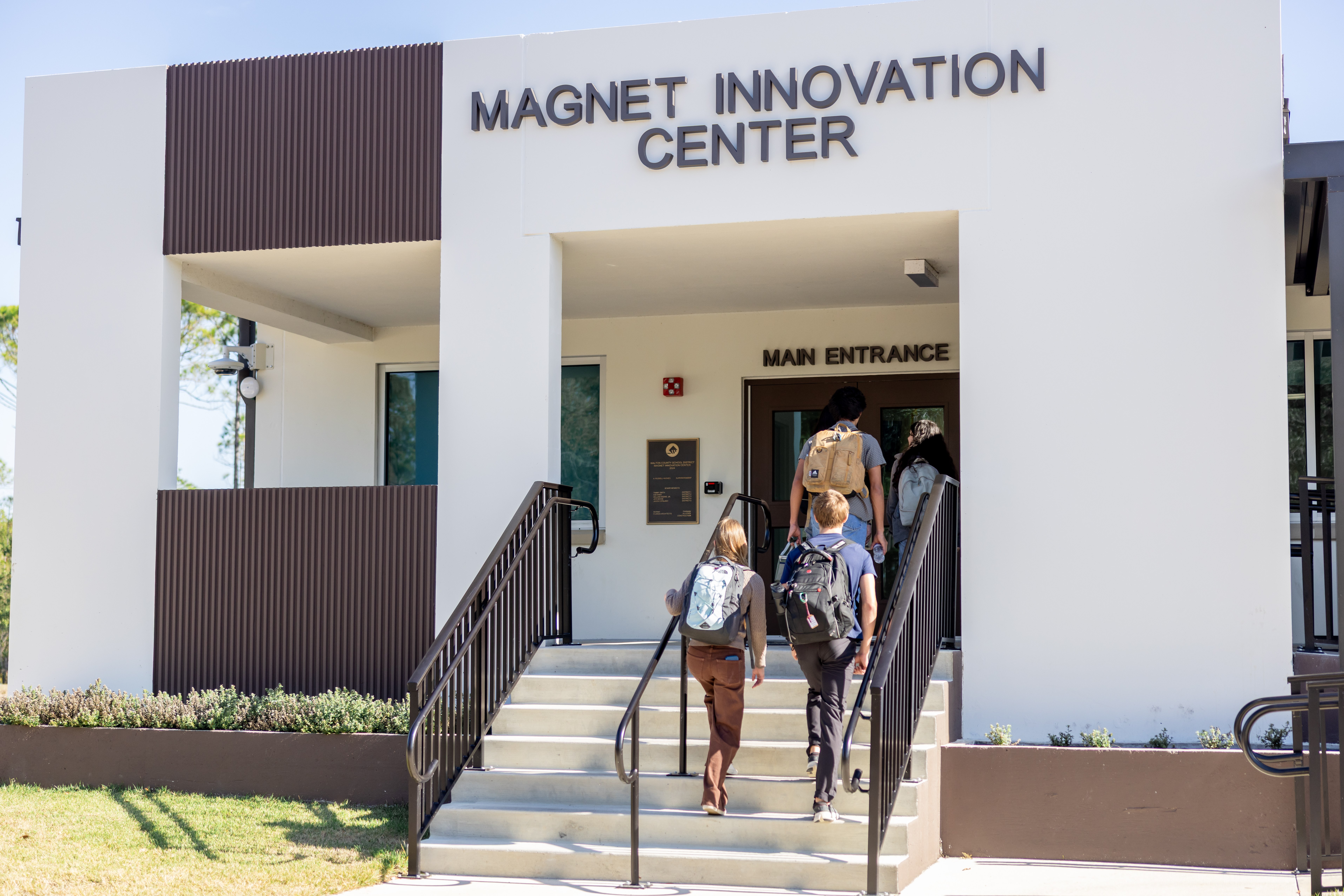 mic students walking into building