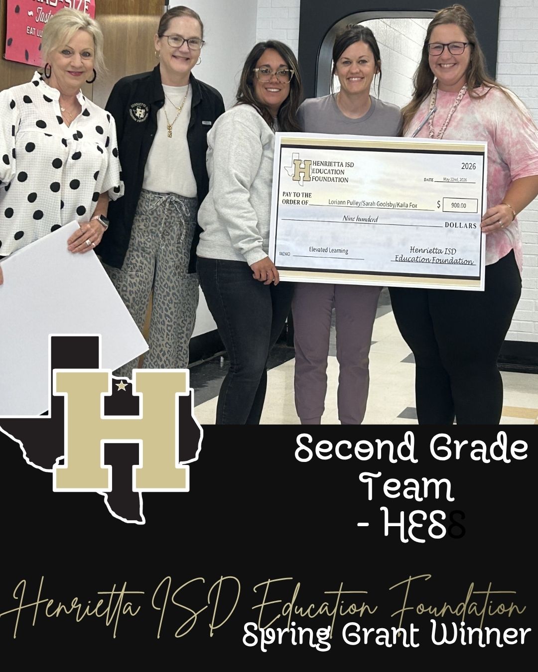 Five women hold a large check and a large white paper. A text overlay reads "Second Grade Team - HE&S".