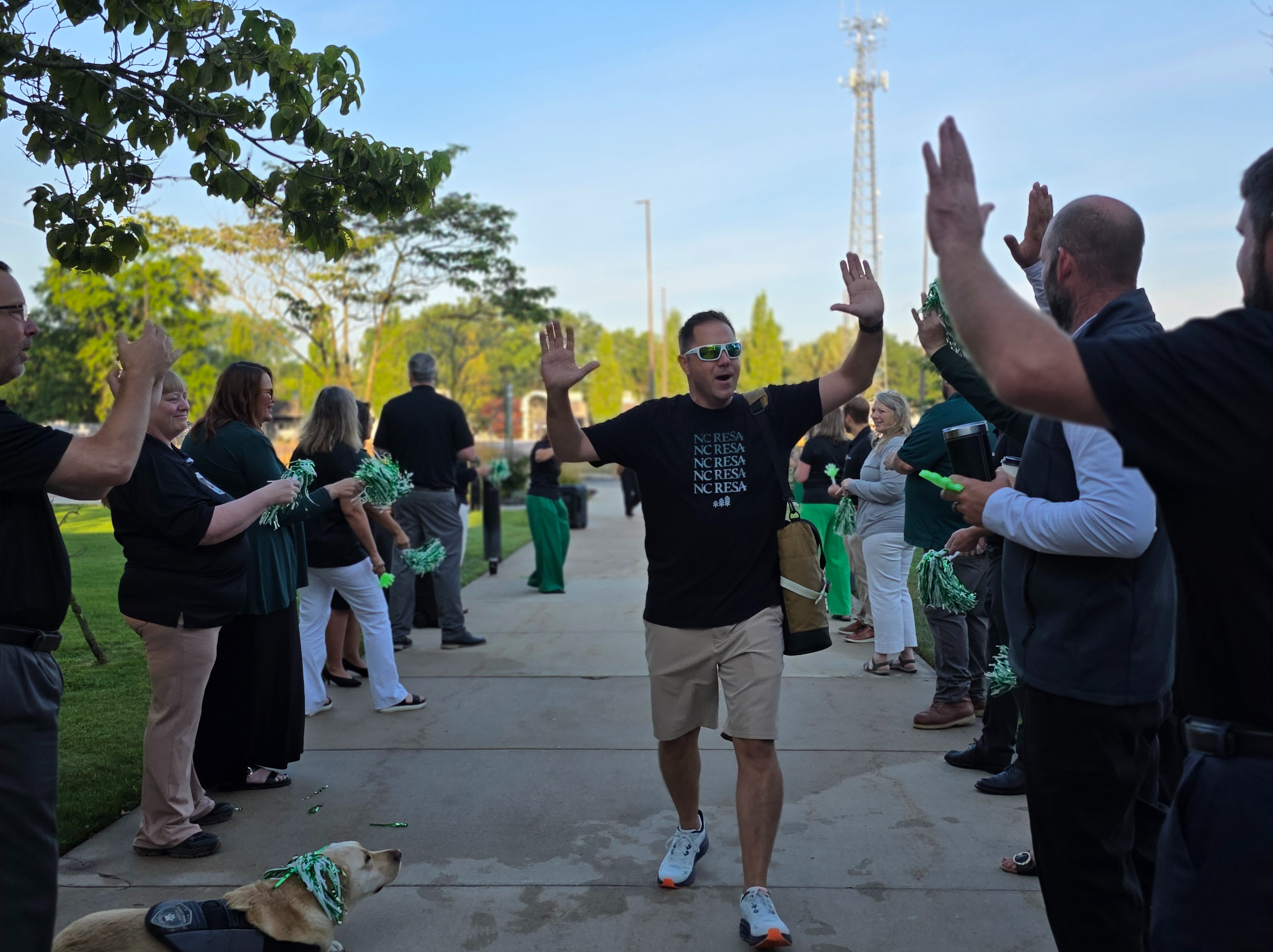 Staff on opening day cheering each other on.