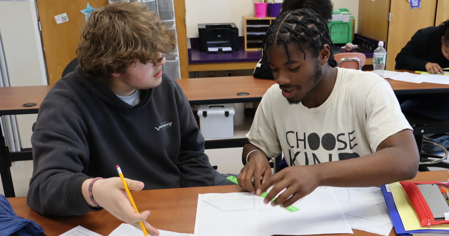 Students work together on an assignment