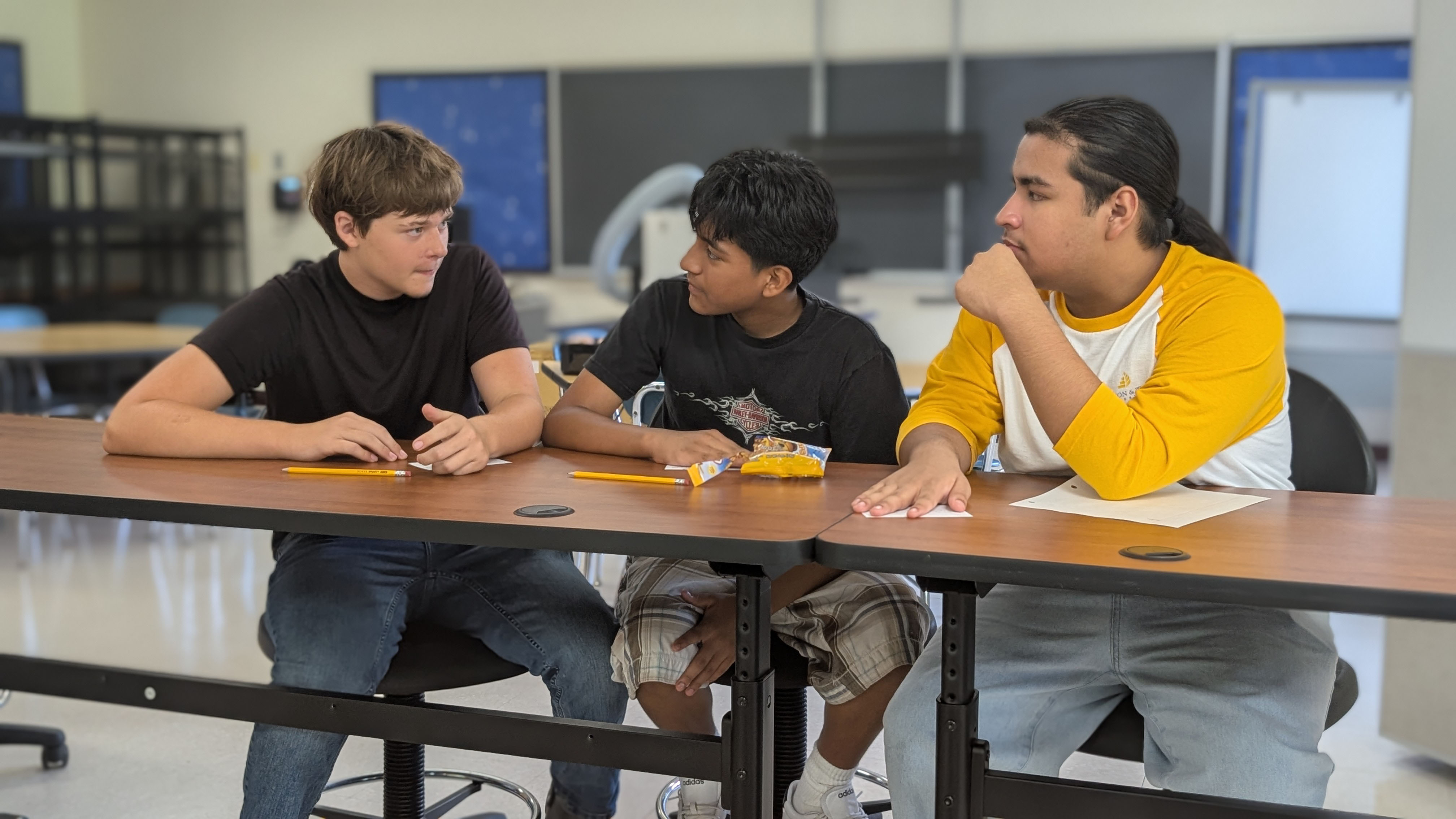 Three students collaborating