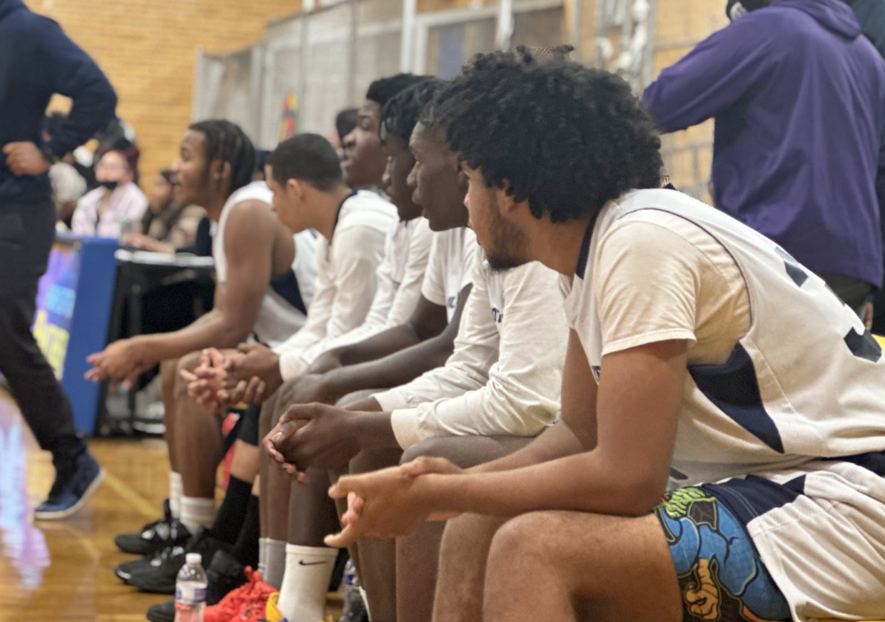 basketball team on bench