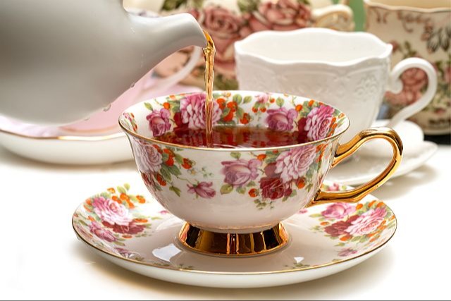 tea pouring into teacup