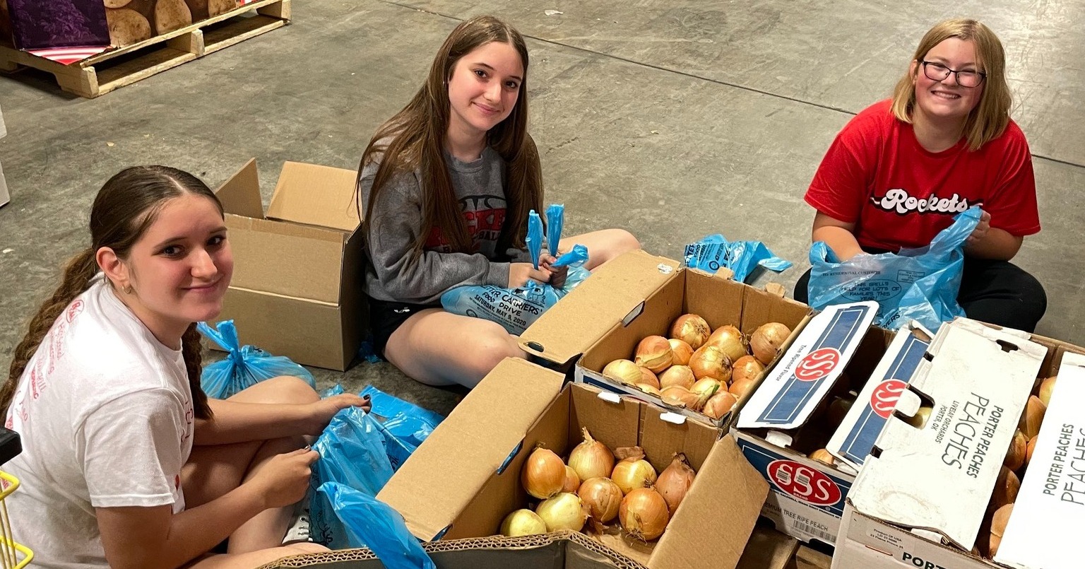 KAY Club boxing up onions