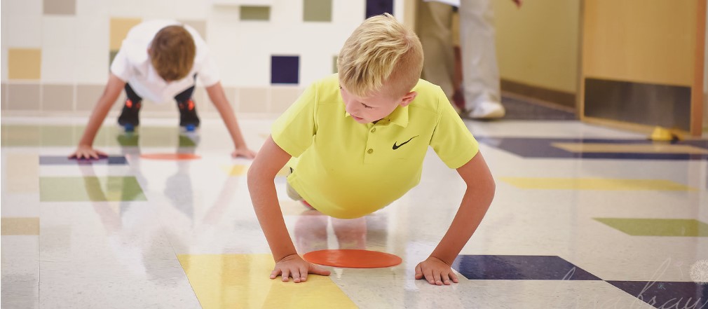 Two kids planking