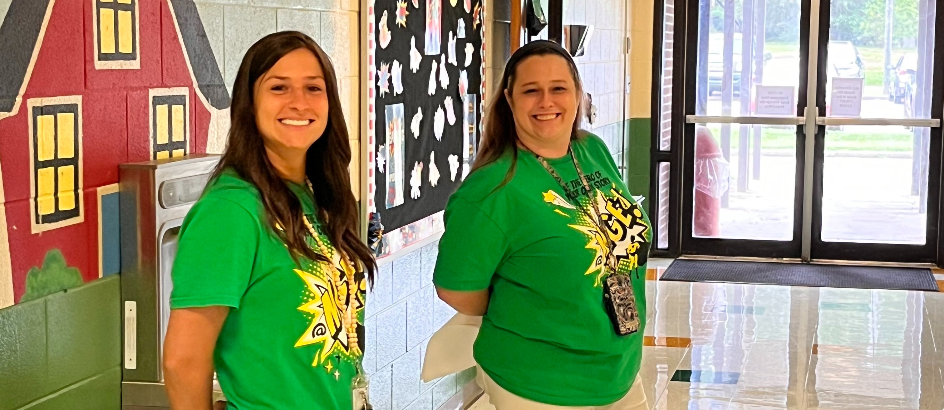 Mrs. Hooper and Mrs. Guy welcome students and parents to Open House