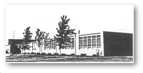A black and white photo of the school.