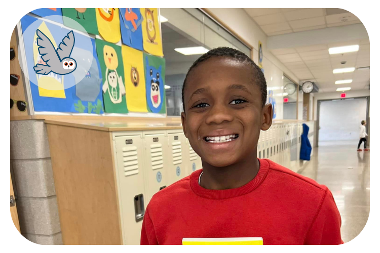 overland student smiling at the camera for a birthday book picture.