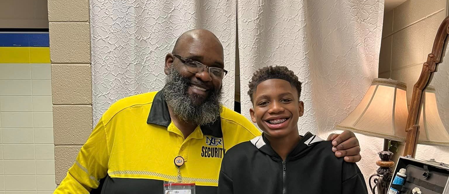 Mr. Johnson and student- Mentoring- Confidence-Education