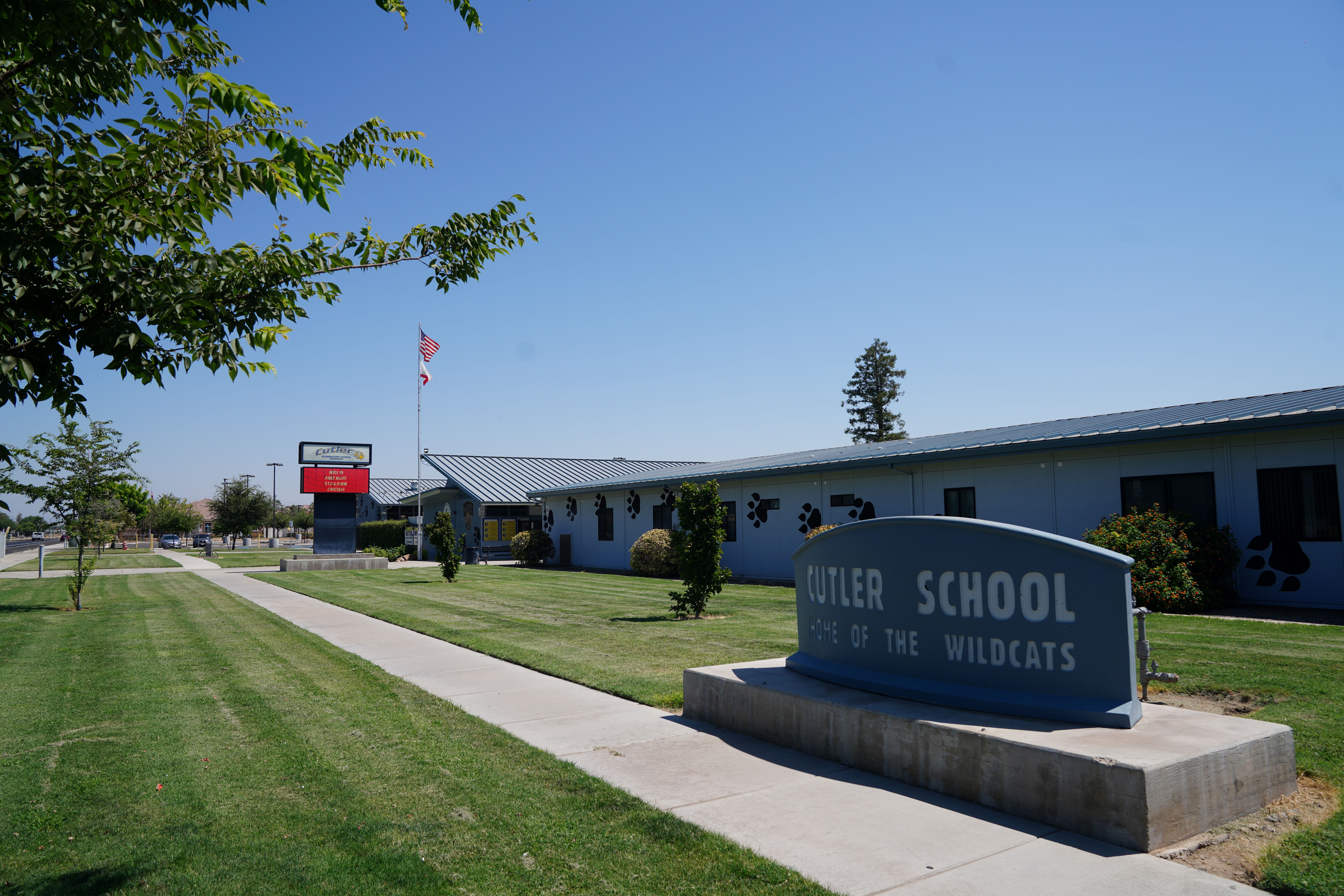 Front of school sign with lawn