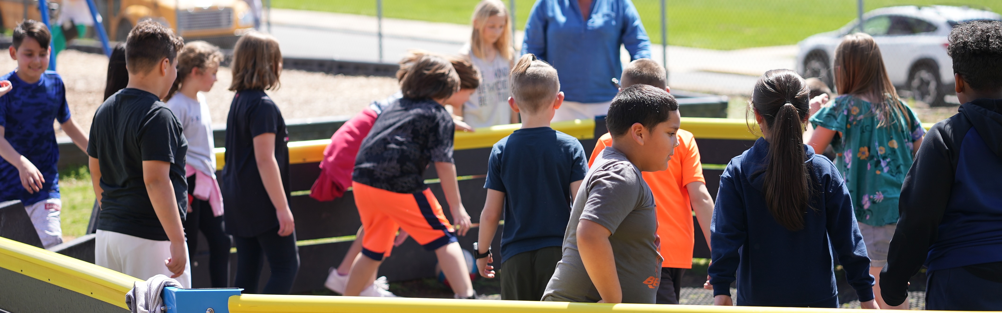 students playin on outdoor playground