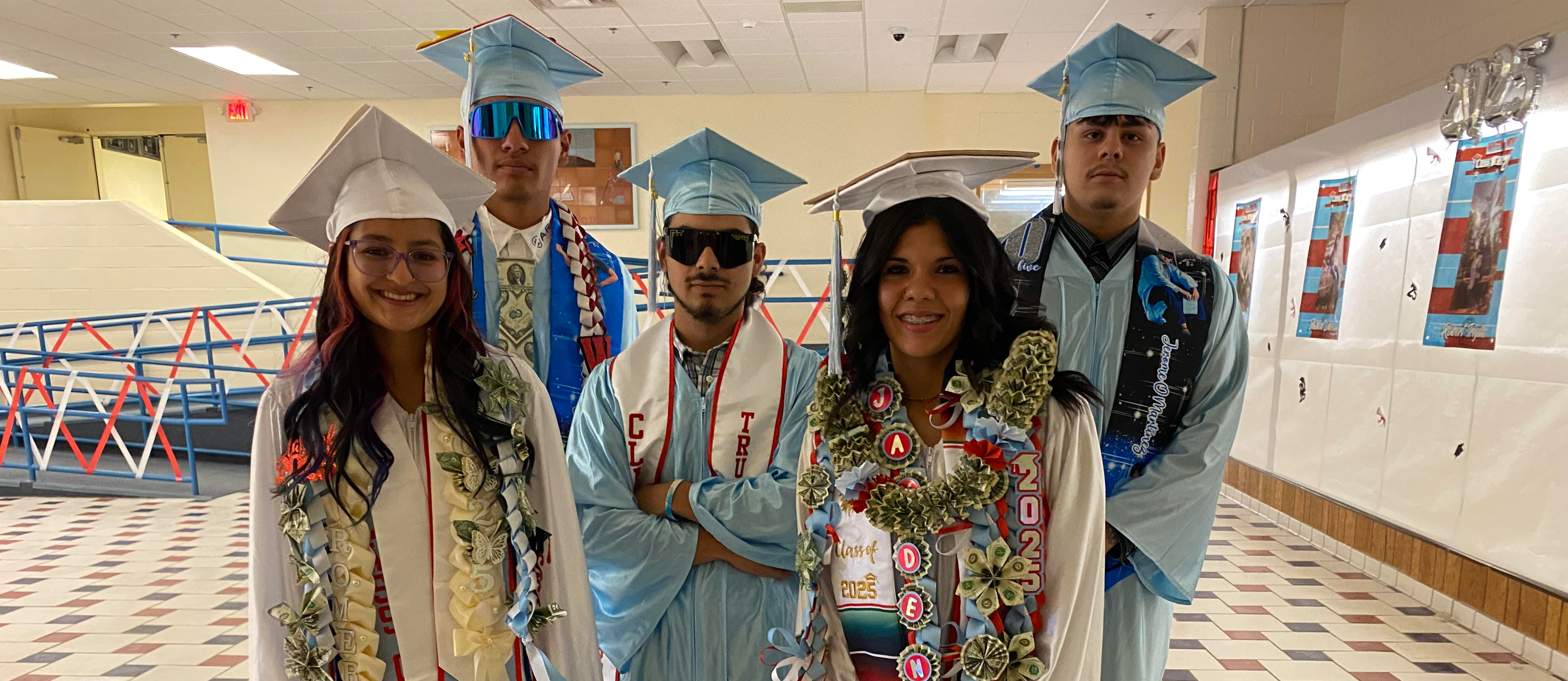 High School Graduates in Caps and Gowns
