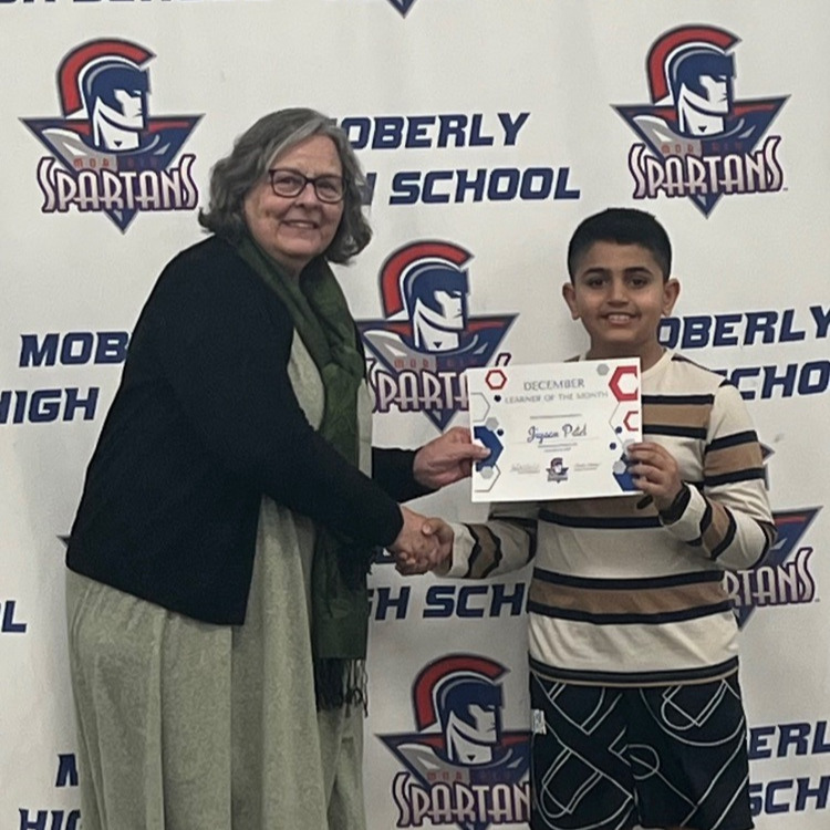 Jiyaan Patel, GBE learinger of the month, with Debbie Young. 