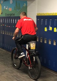 teacher in bicycle