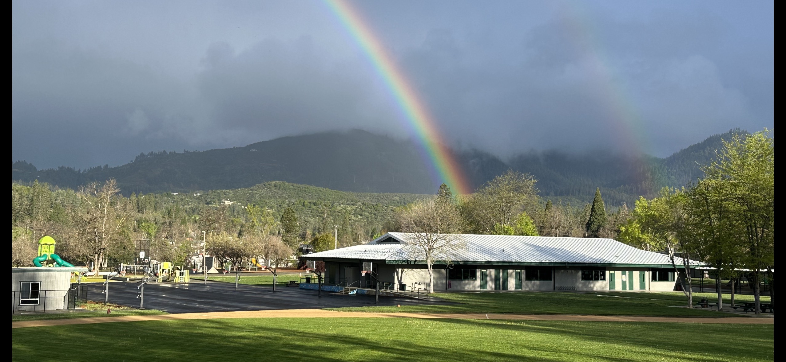 image of wes campus with rainbow