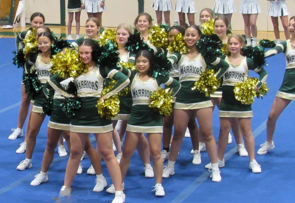 Pictures of middle school cheerleaders in action