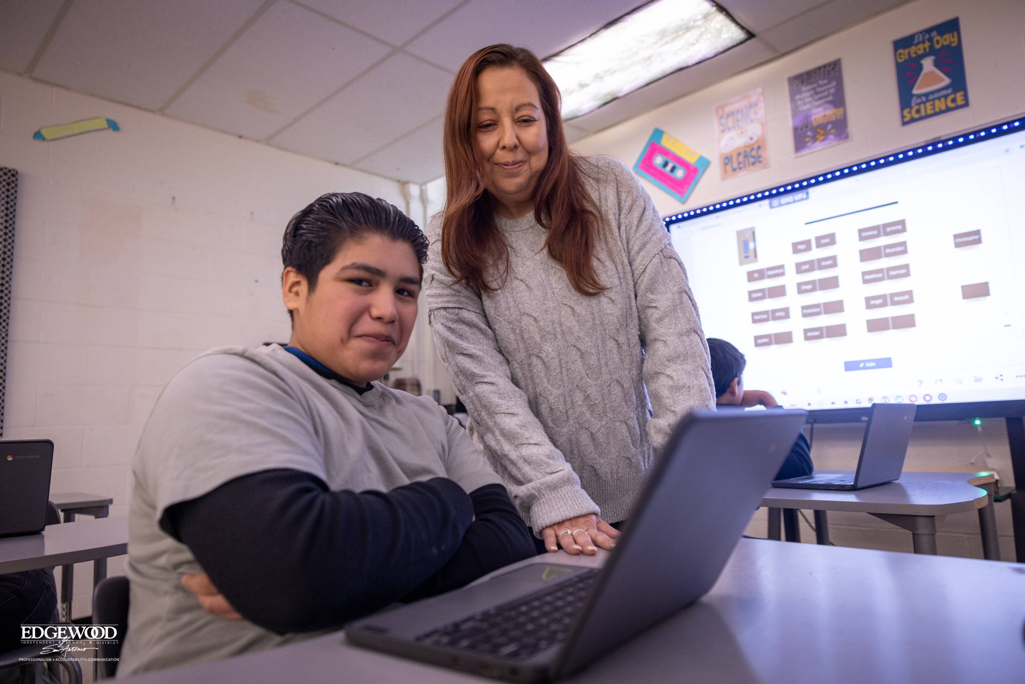 teacher and student at Gus Garcia University School