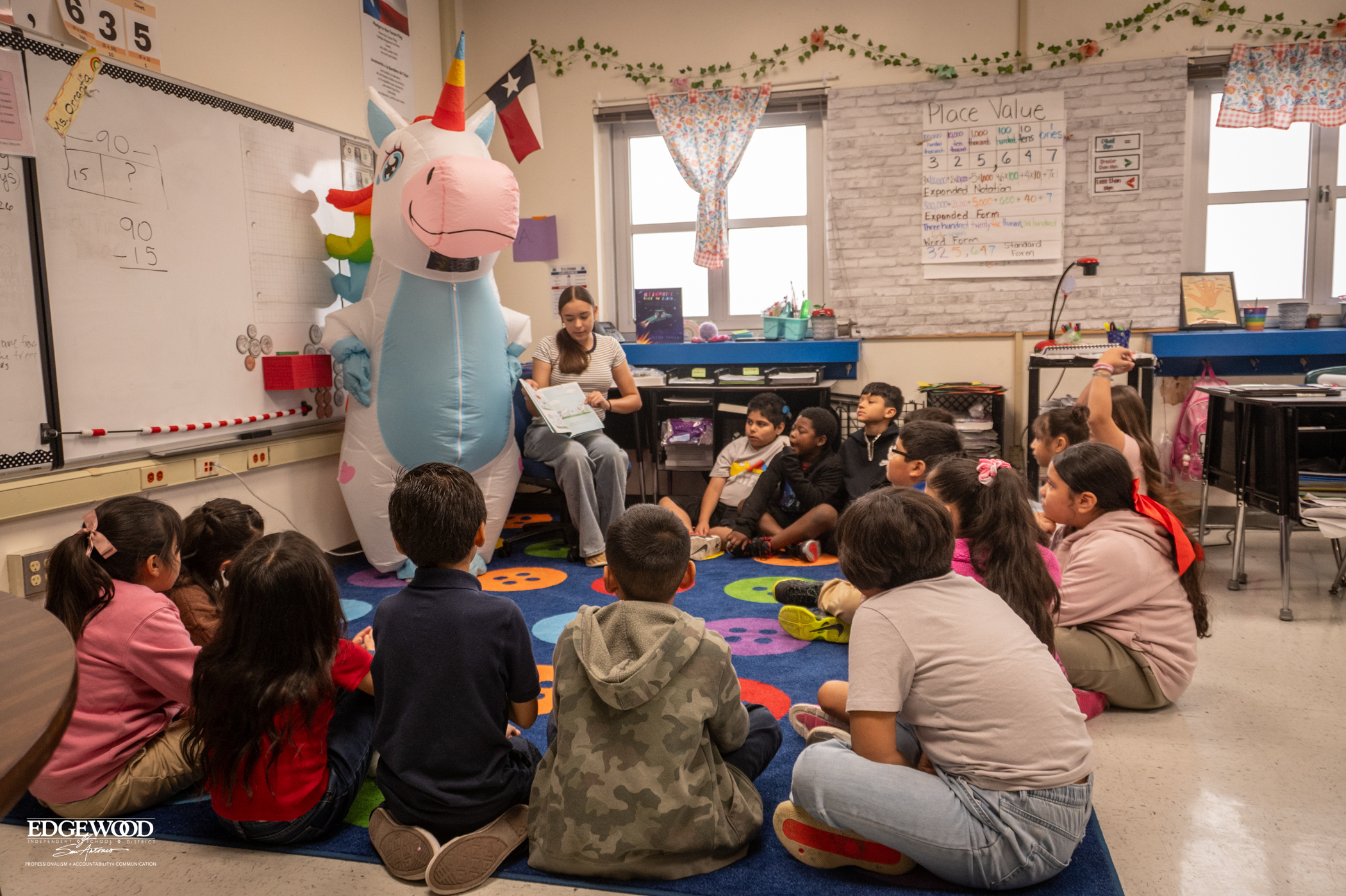 student teacher reads to students