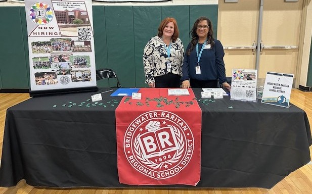 Michelle Munley and Nancy Bonilla at a job fair table