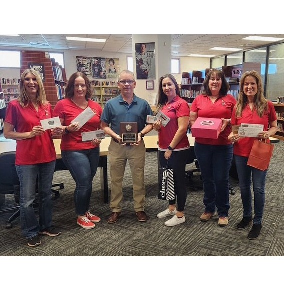 Tony Mallinger receives the Dec 2024 Golden Apple Award from the K12 Foundation