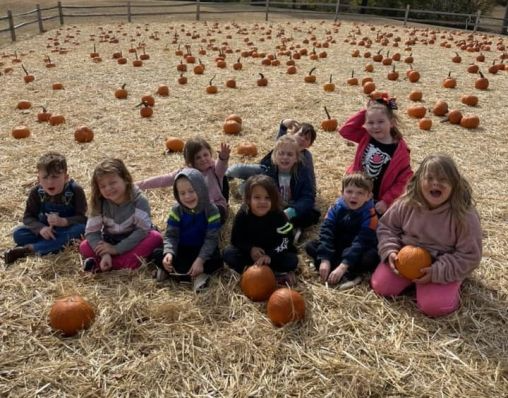 kids in pumpkin patch