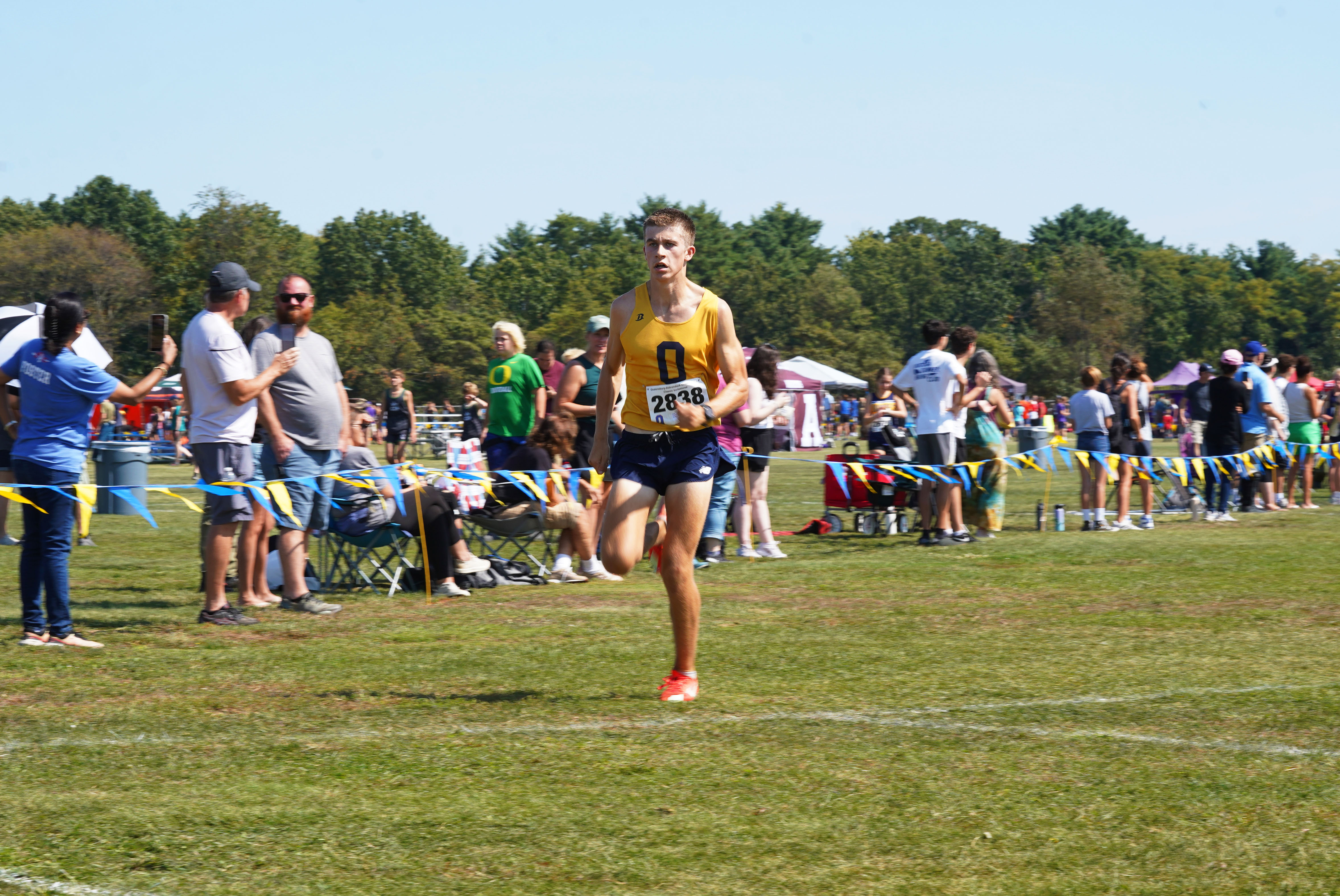 Student runs in cross-country event.