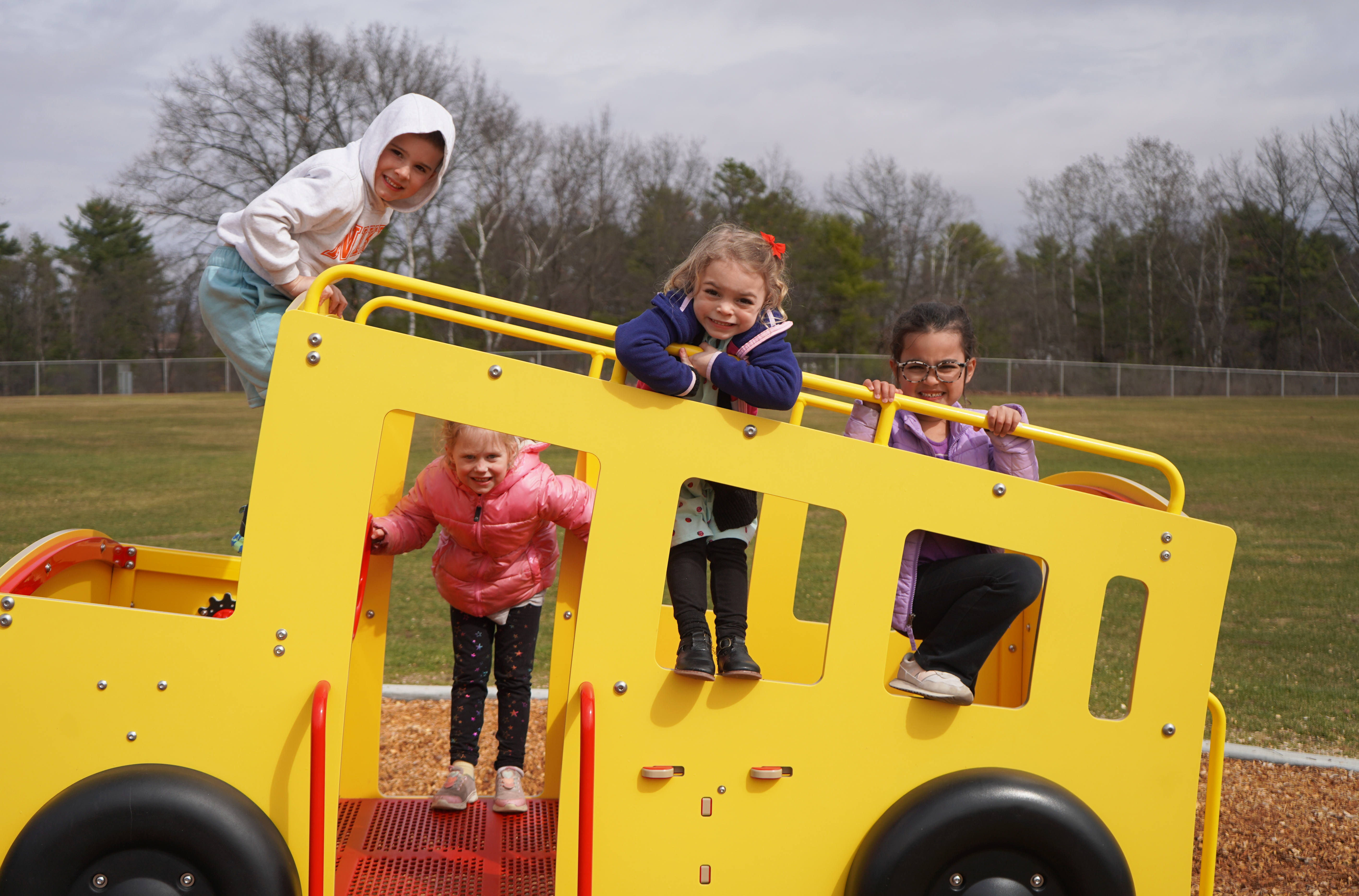 Students play on QES playground.