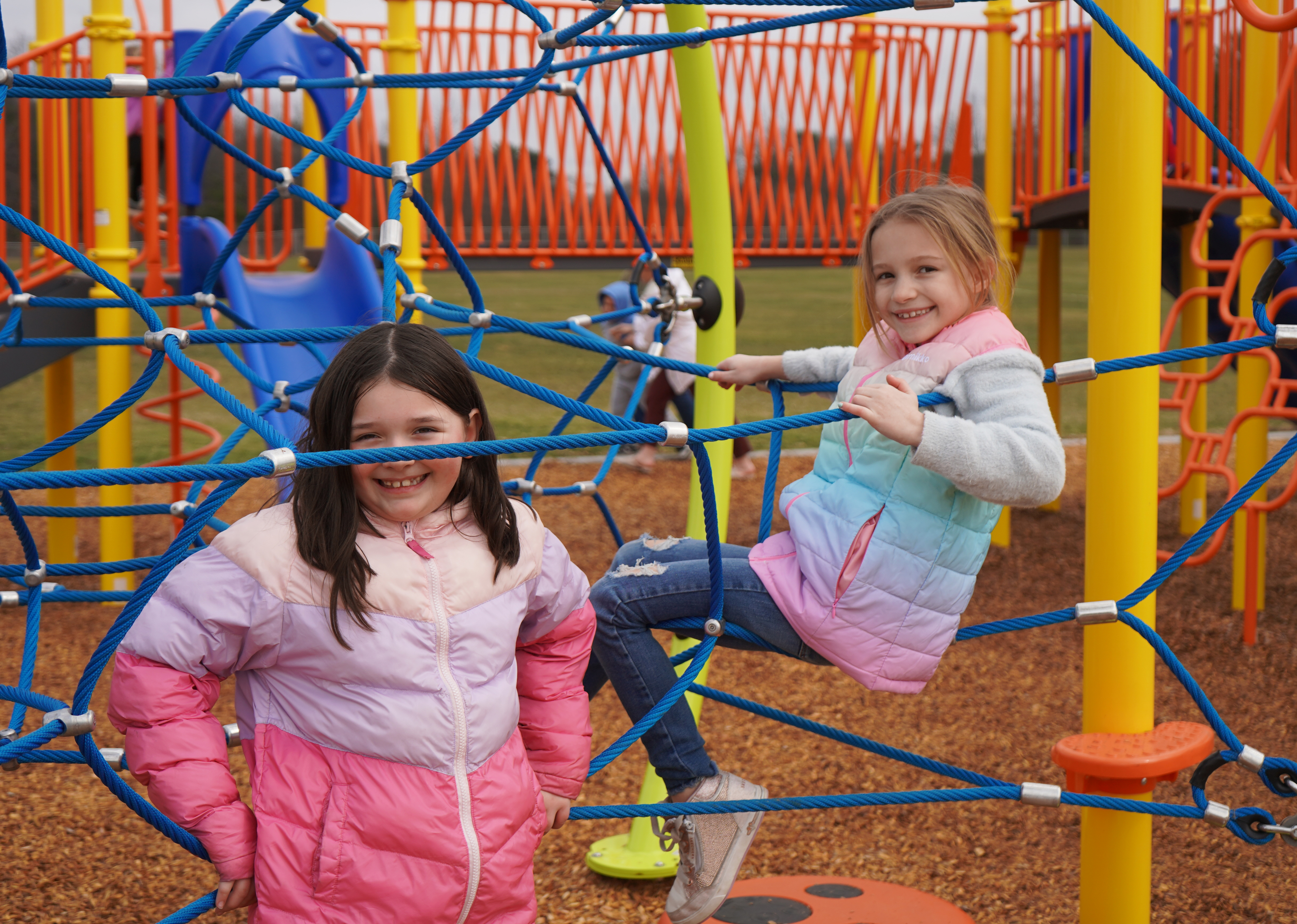 Students play on playground.