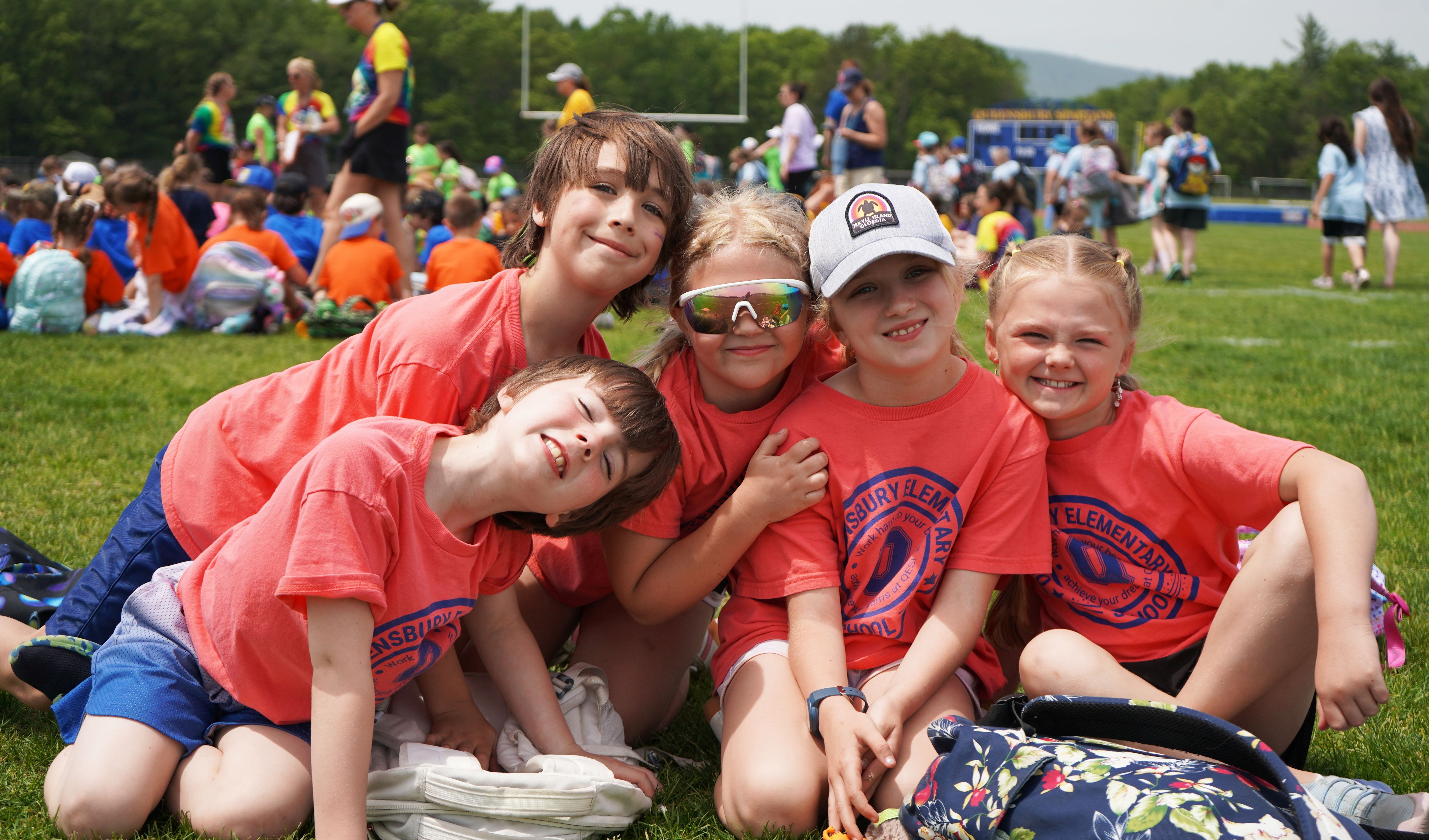Students pose in Dream Shirts during Field Day.