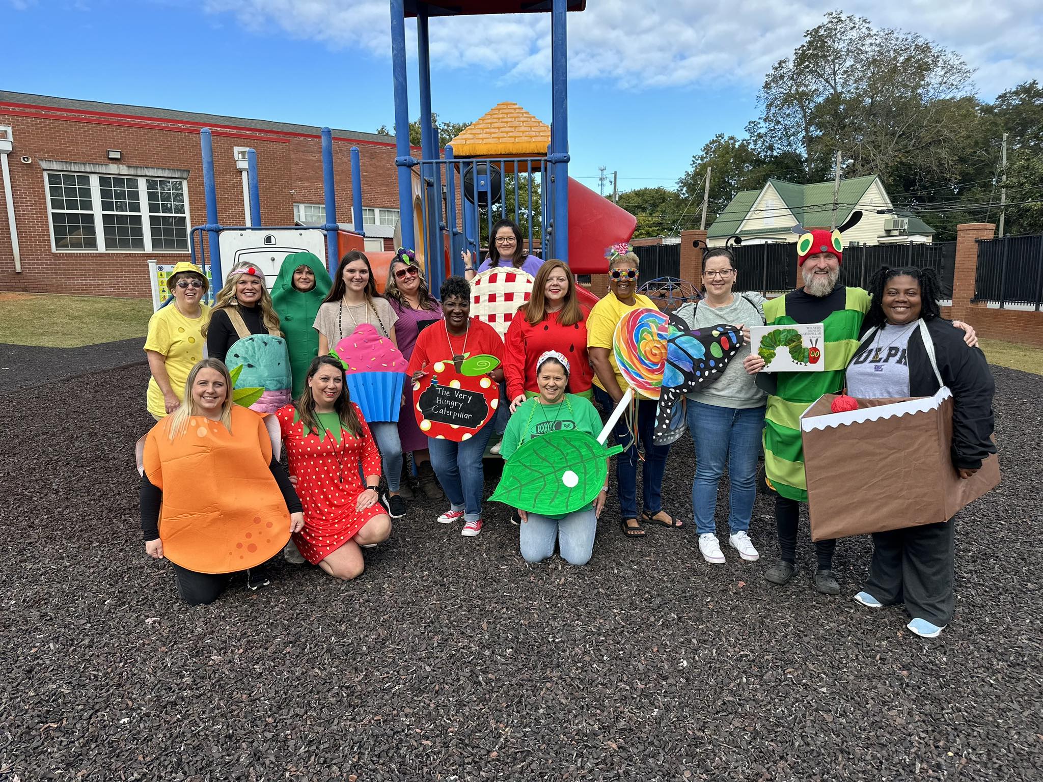 Pre-k staff all in the Hungry Caterpillar