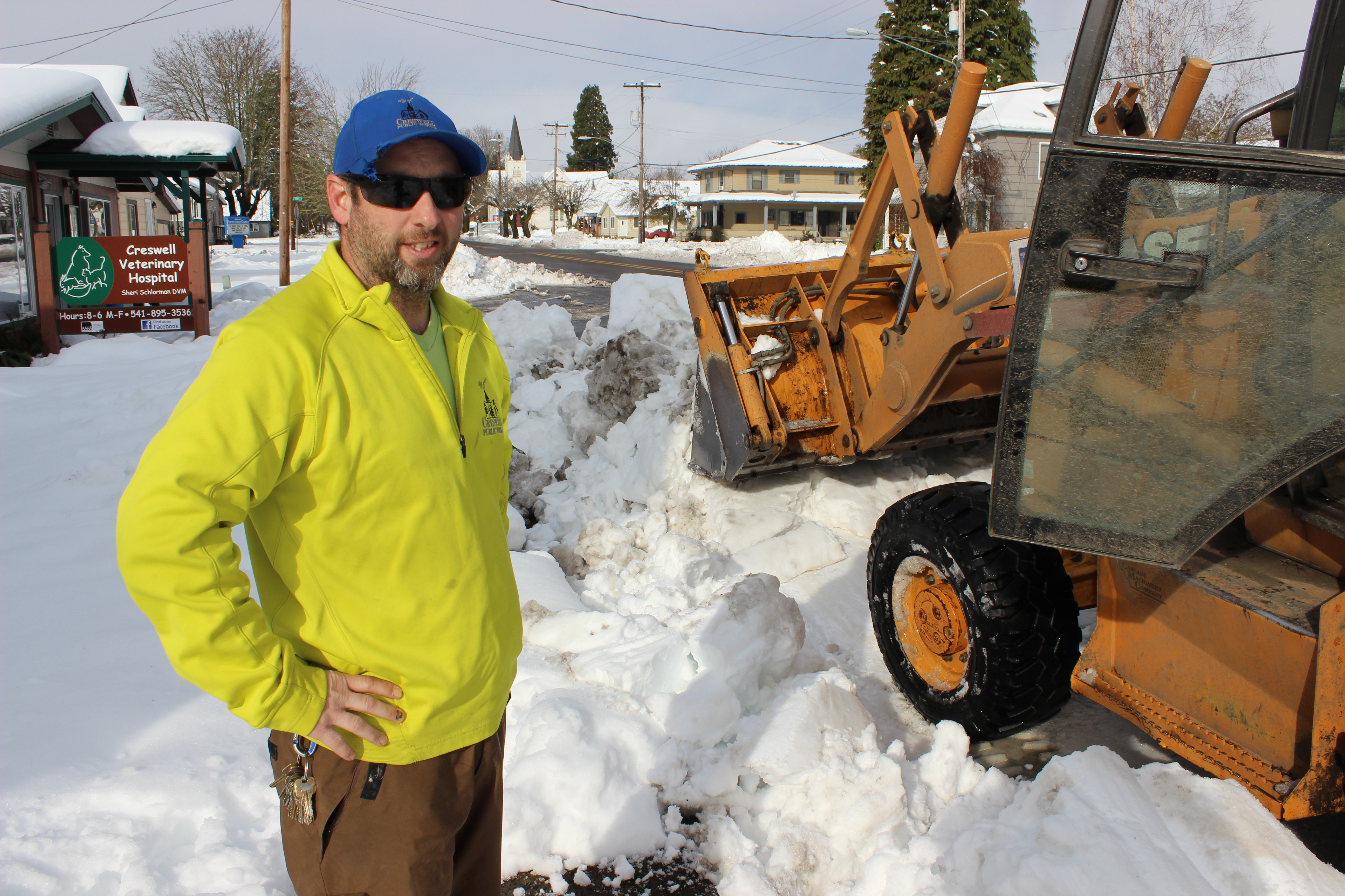 Image of Creswell Public Works employee Mitch working during a very snowy day