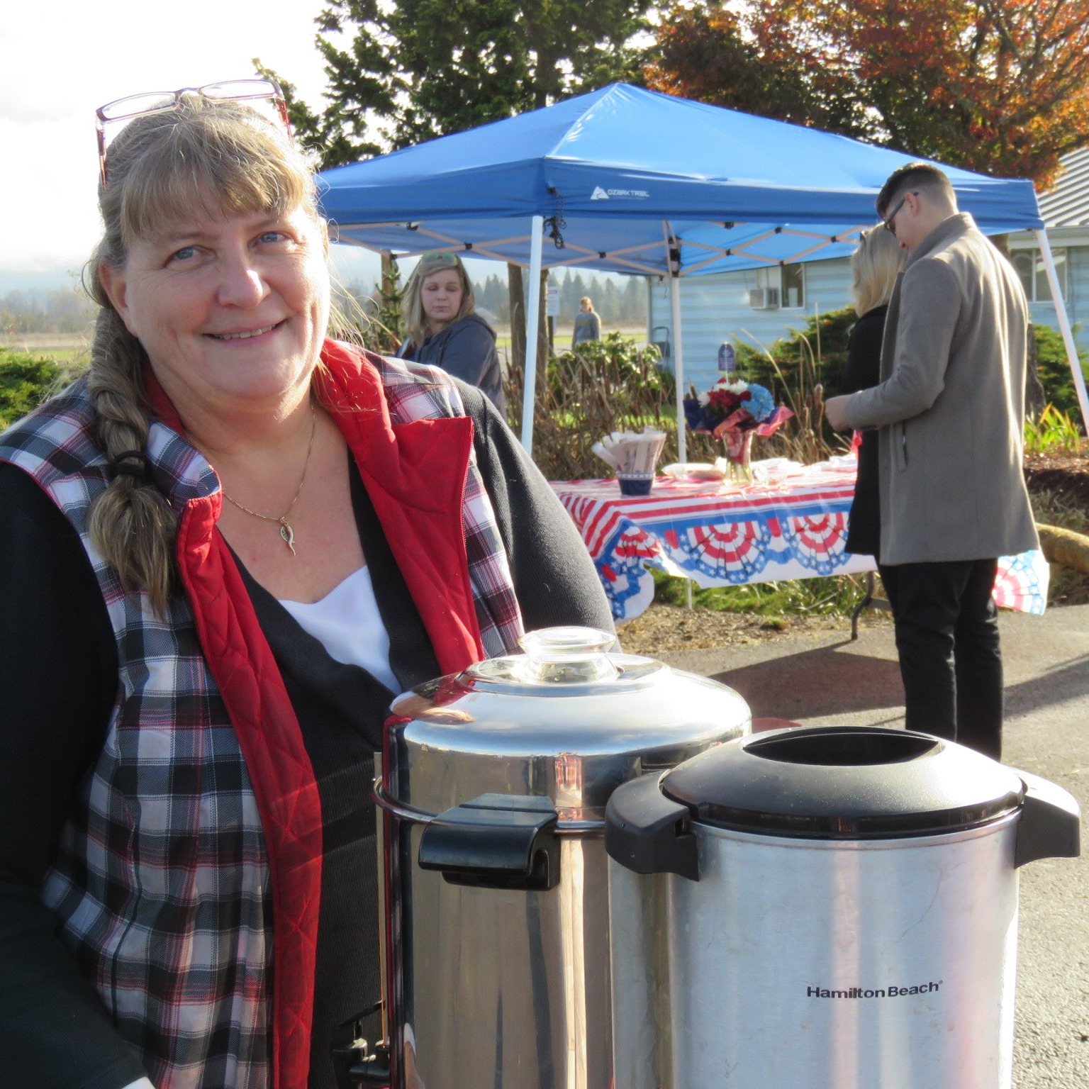 Airport Manager Shelley Humble serving coffee at the Creswell Airport