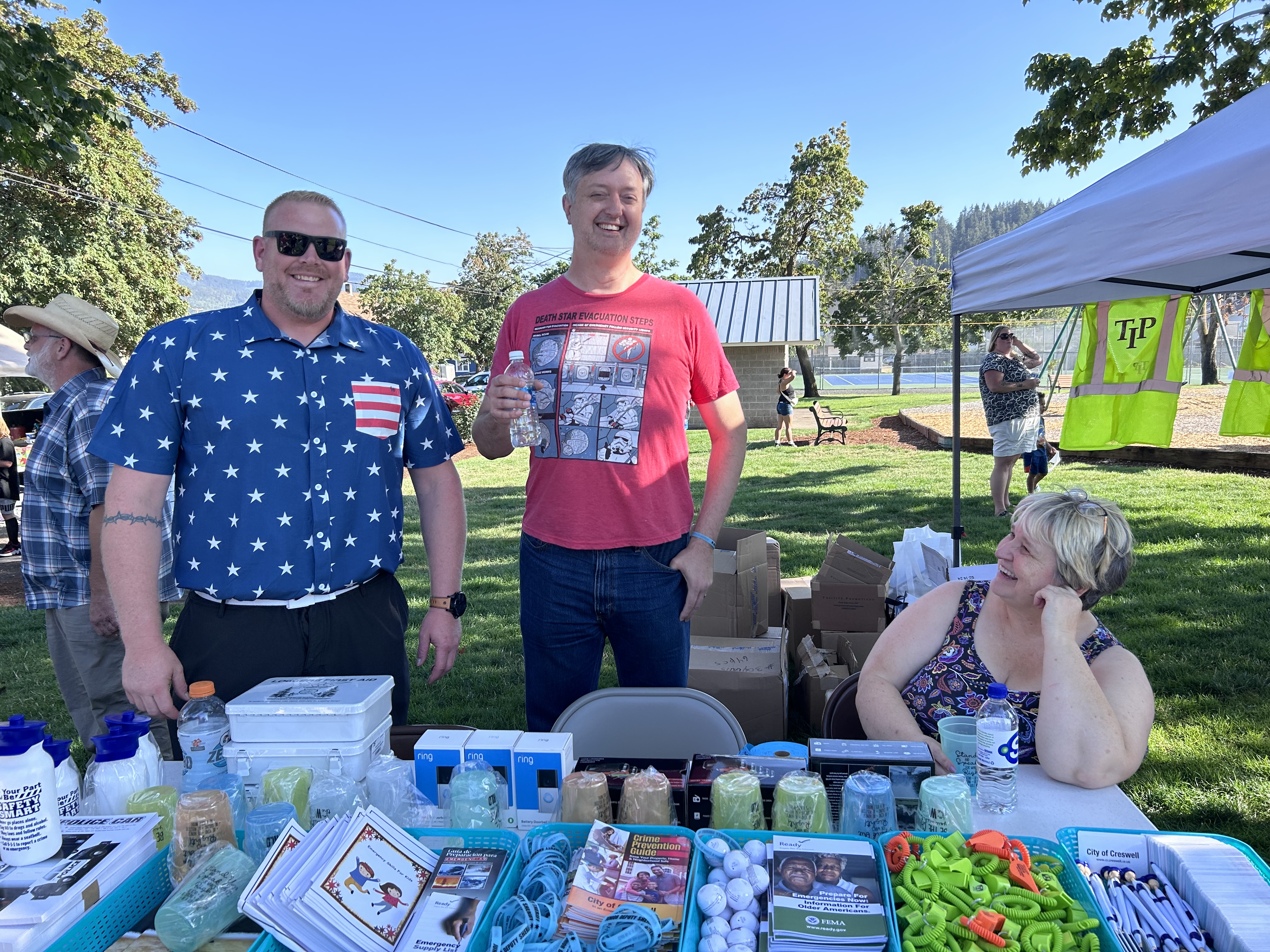 Councilor Nick Smith, Councilor Clark Kent, and City Manager Michelle Amberg at National Night Out 2024