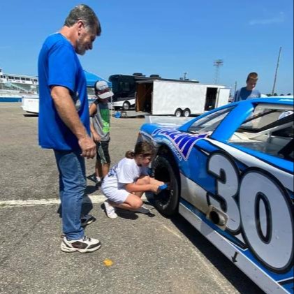 Student changing the tires