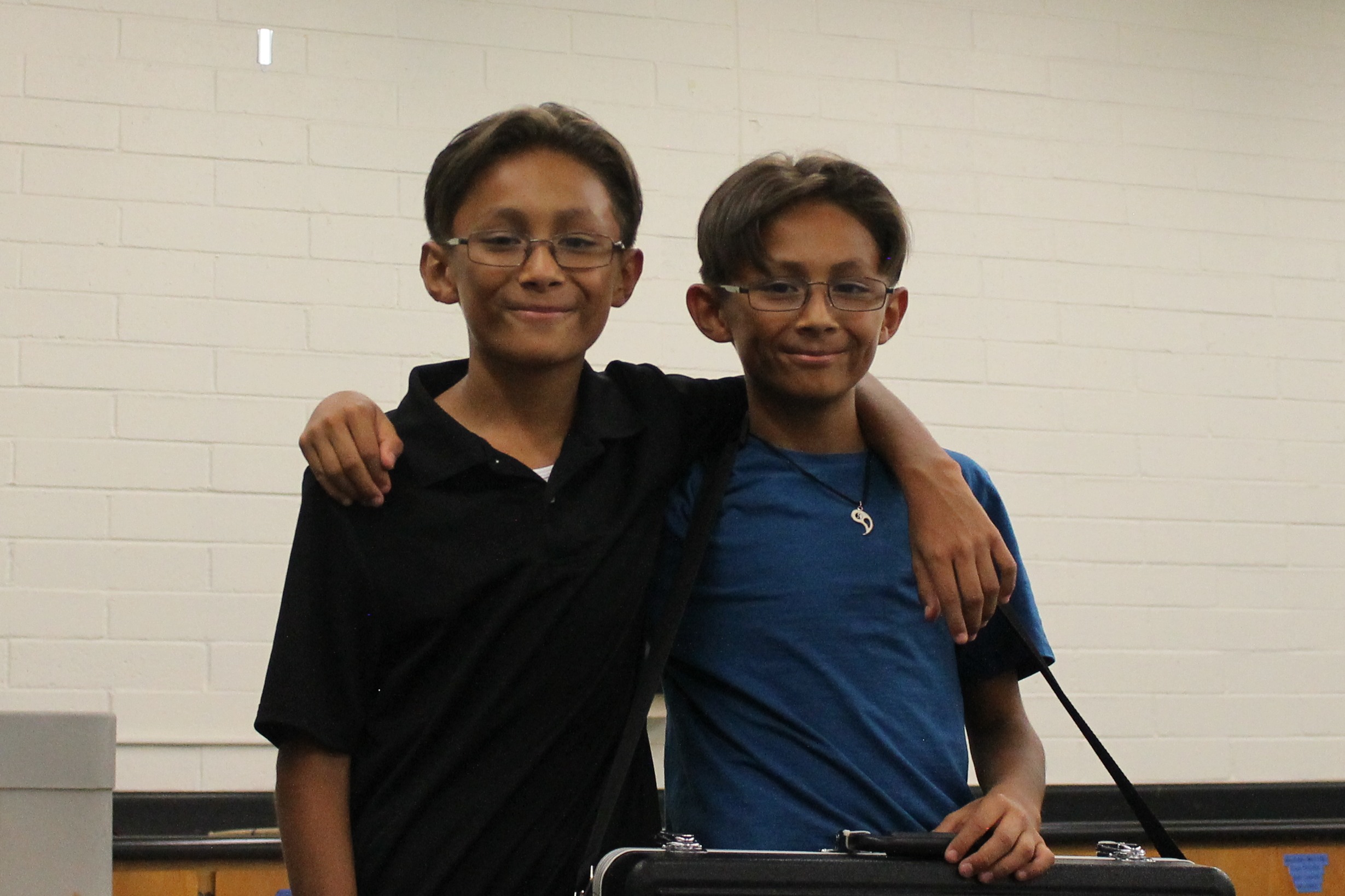 twin students pictured during band