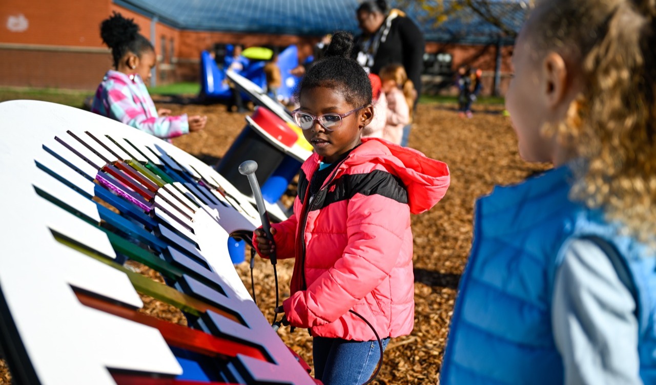 Girl playing on playground