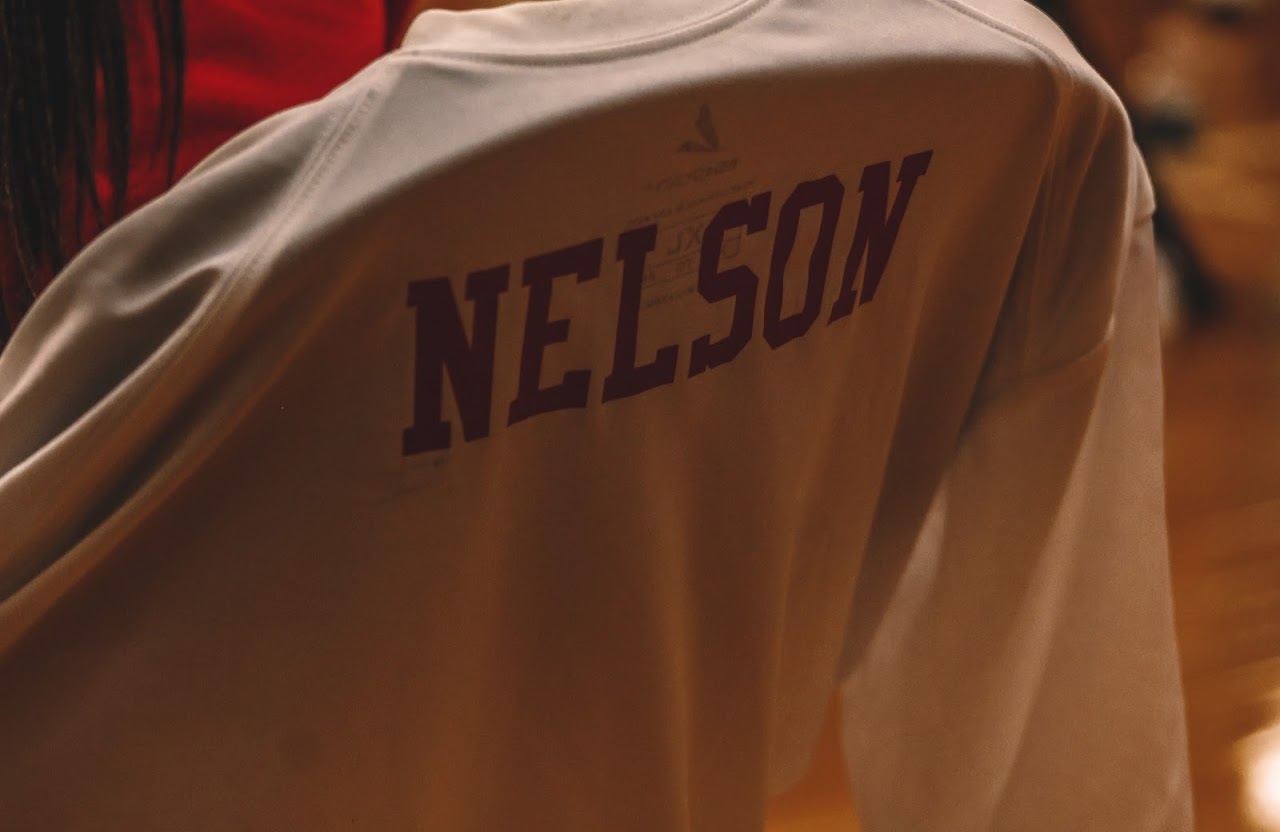 t shirt on a chair that says nelson