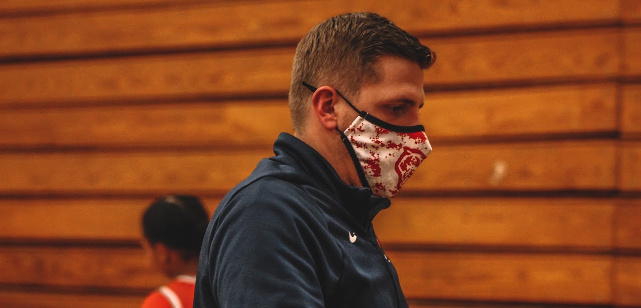 coach with facemask