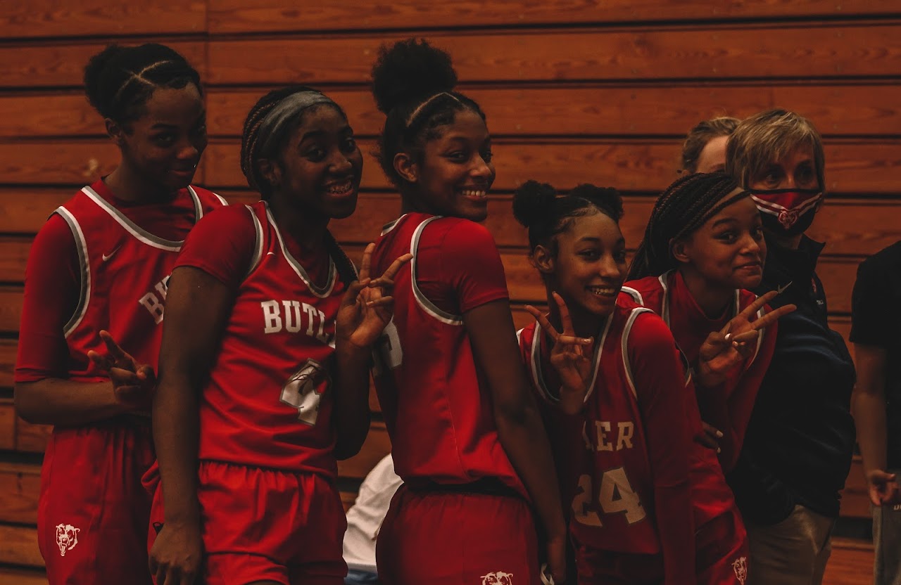 basketball players smiling at the camera