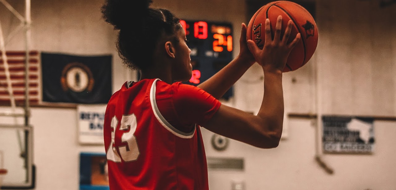 basketball player with the ball in the hands