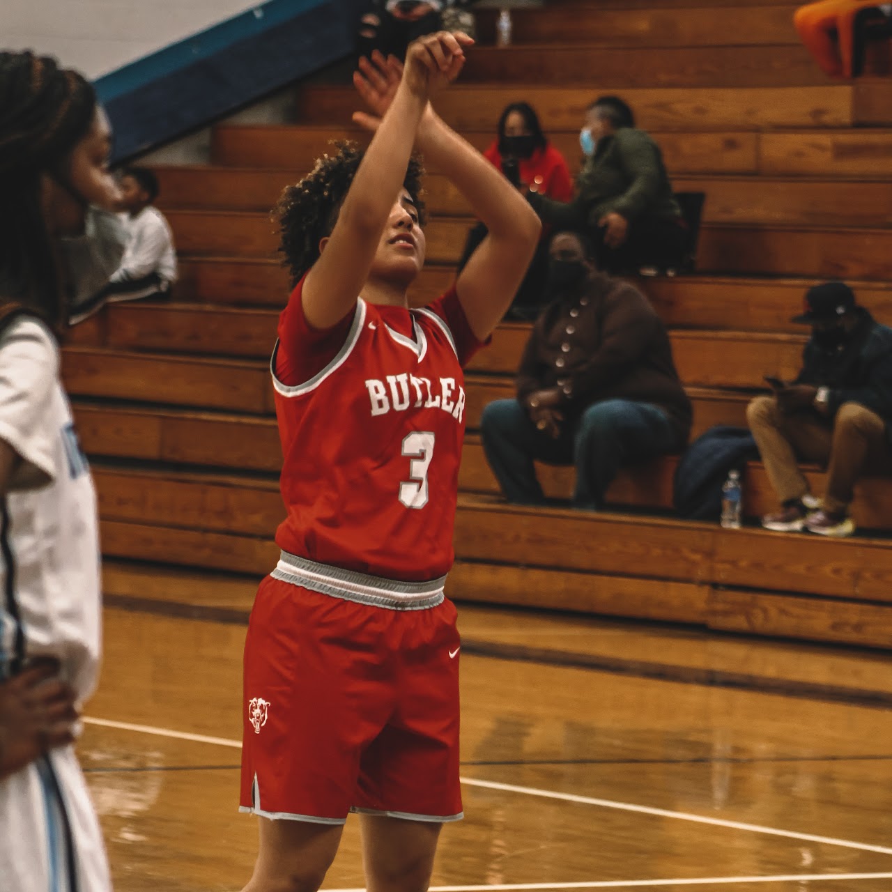 basketball player throwing the ball