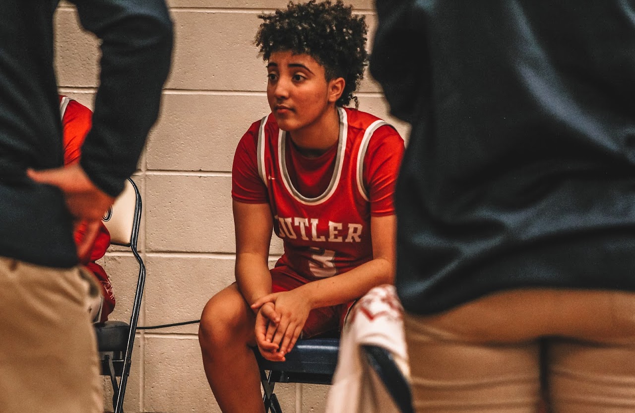 basketball player sitting on a chair resting