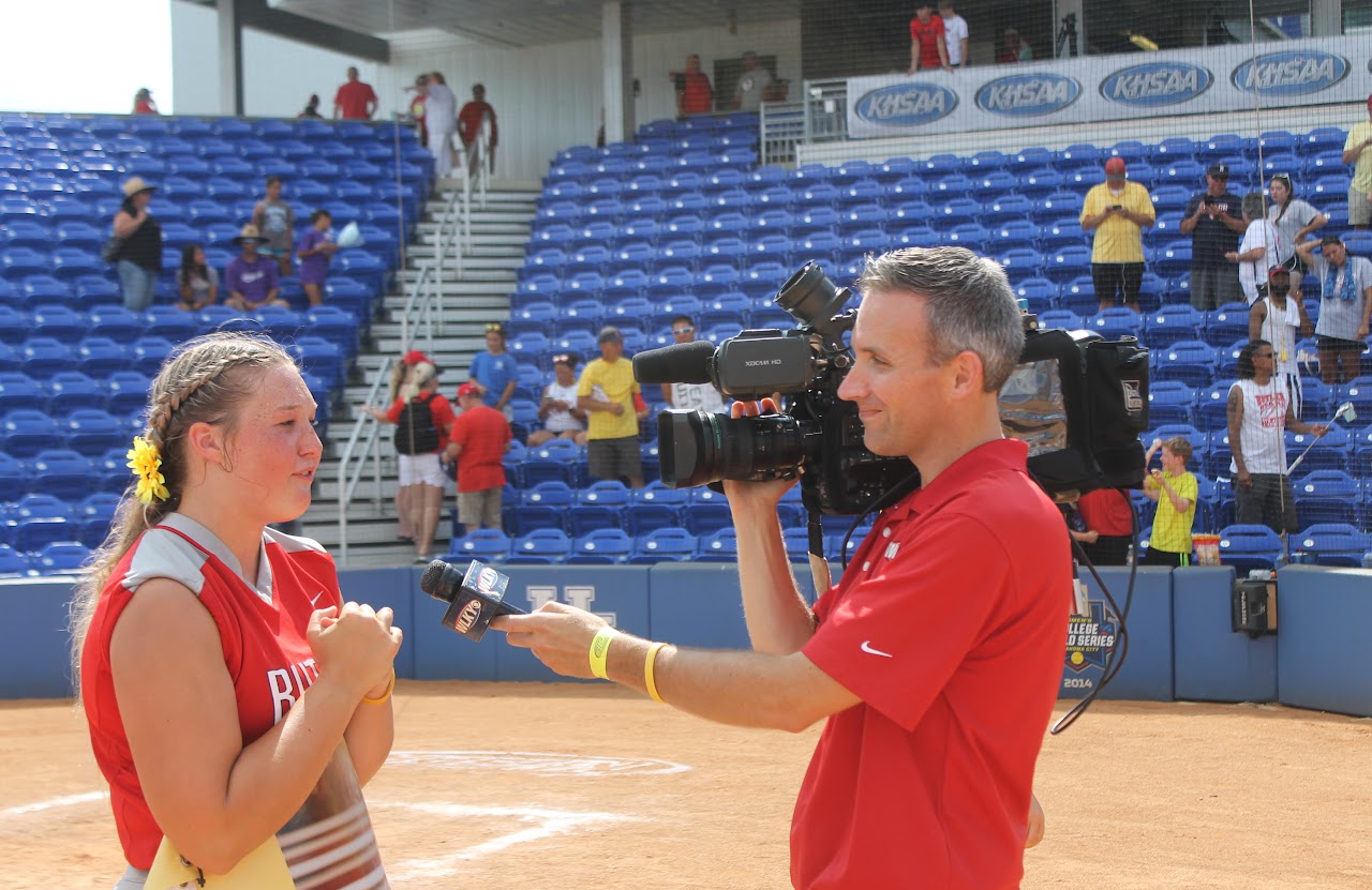 cameraman interviewing the coach